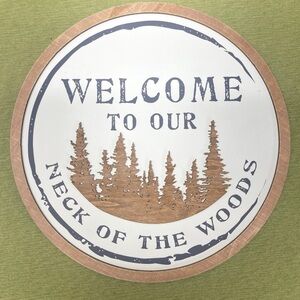New country rustic sign “Welcome to our neck of the woods”